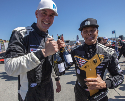 Ron Atapattu and Kevin Madsen celebrate at Laguna Seca